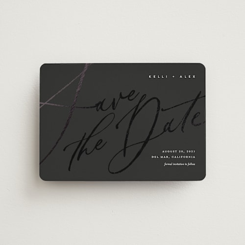 This is a noir save the date magnets with foil pressed by Eric Clegg called brush script printing on magnet paper in magnet