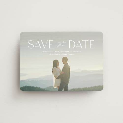 This is a cloud save the date magnets with standard by Kate Ahn called monterosso printing on magnet paper in magnet