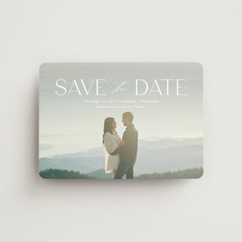 This is a cloud save the date magnets with standard by Kate Ahn called monterosso printing on magnet paper in magnet