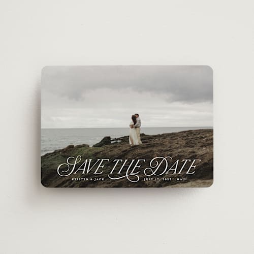 This is a porcelain save the date magnets with standard by Sarah Brown called story book printing on magnet paper in magnet