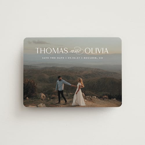 This is a cloud save the date magnets with standard by Elizabeth Bishop called elegantly modern printing on magnet paper in magnet