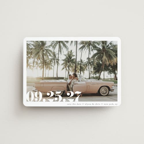 This is a linen save the date magnets with standard by Ashley Cuccio called malibu dreams printing on magnet paper in magnet