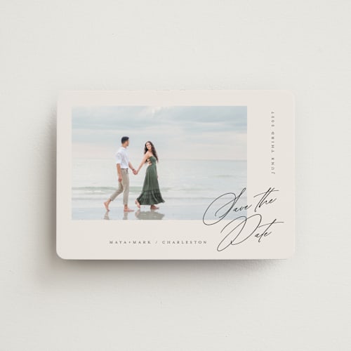 This is a cream save the date magnets with standard by Lori Wemple called posted printing on magnet paper in magnet