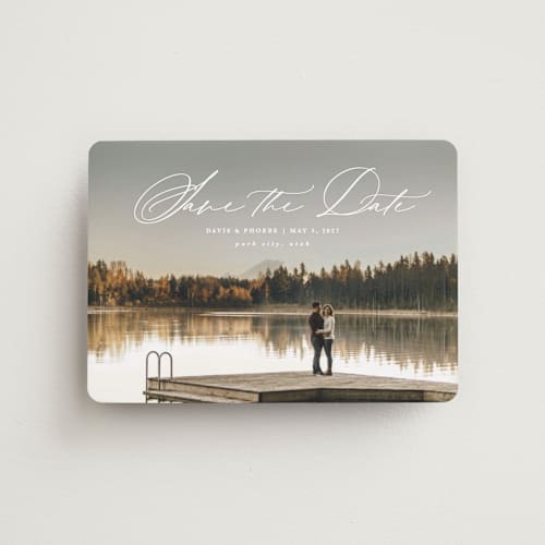 This is a cloud save the date magnets with standard by Kate Ahn called venice printing on magnet paper in magnet