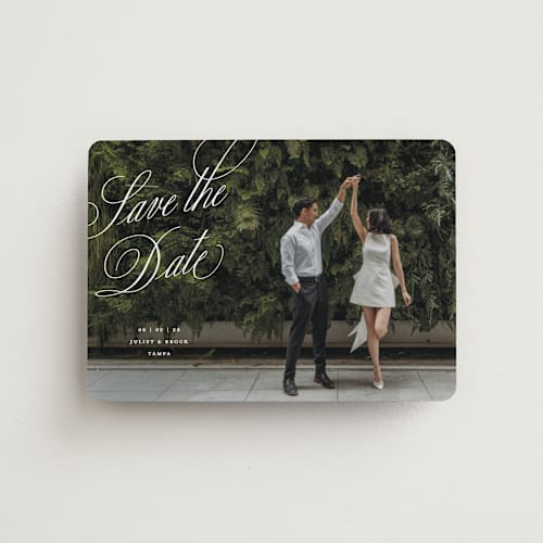 This is a pearl save the date magnets with standard by Pixel and Hank called enamored printing on magnet paper in magnet