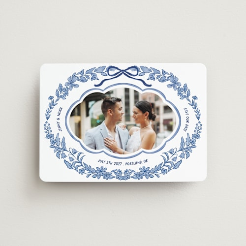 This is a porcelain save the date magnets with standard by Elly called charm printing on magnet paper in magnet