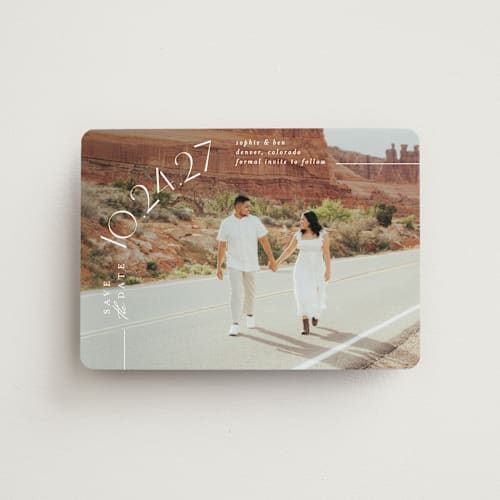 This is a pearl save the date magnets with standard by Brooke Chandler called curved date printing on magnet paper in magnet