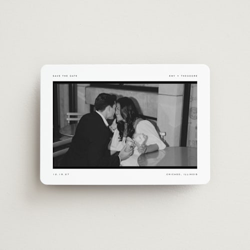 This is a onyx save the date magnets with standard by Pixel and Hank called photosnap printing on magnet paper in magnet