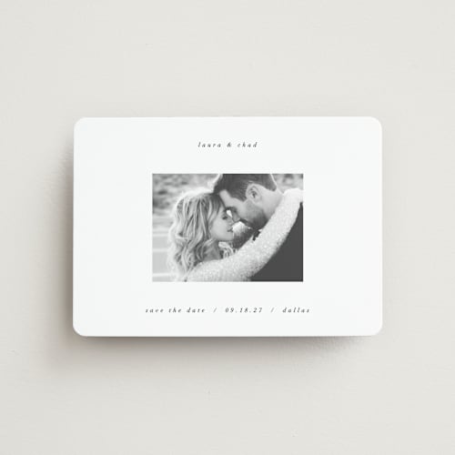 This is a snow save the date magnets with standard by AK Graphics called understated elegance printing on magnet paper in magnet