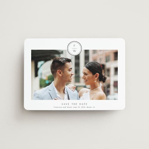 This is a cotton save the date magnets with standard by Stacey Meacham called circle monogram printing on magnet paper in magnet