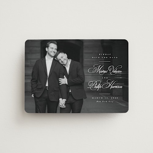 This is a newspaper save the date magnets with standard by Lea Delaveris called grand printing on magnet paper in magnet