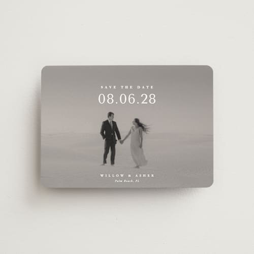 This is a moonstone save the date magnets with standard by Lucrecia Caporale called classic big date printing on magnet paper in magnet