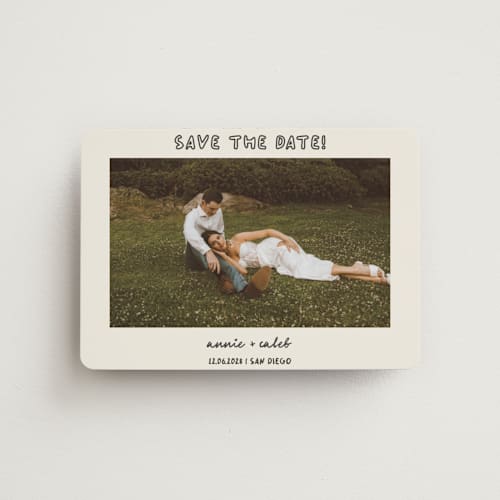 This is a ivory save the date magnets with standard by Stephanie Heinrich Godbout called modern outline printing on magnet paper in magnet