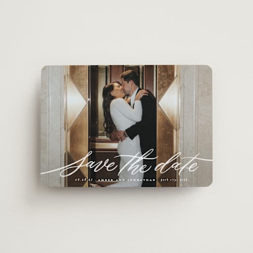 This is a chamomile save the date magnets with standard by Wildfield Paper Co called daisy printing on magnet paper in magnet