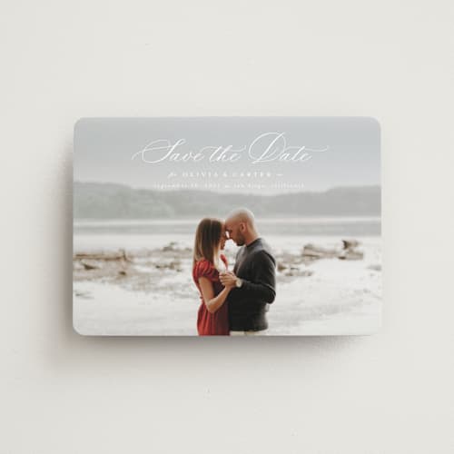 This is a cloud save the date magnets with standard by Ashlee Townsend called enchanted love printing on magnet paper in magnet