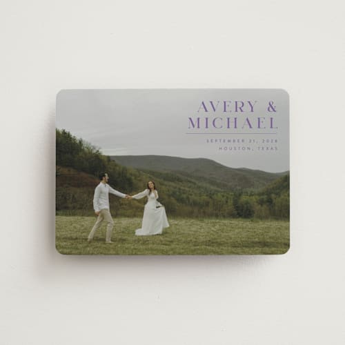 This is a lavender save the date magnets with standard by Juneau Designs called hold tight printing on magnet paper in magnet