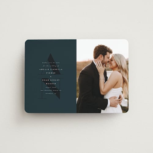 This is a midnight save the date magnets with standard by Up Up Creative called centro printing on magnet paper in magnet