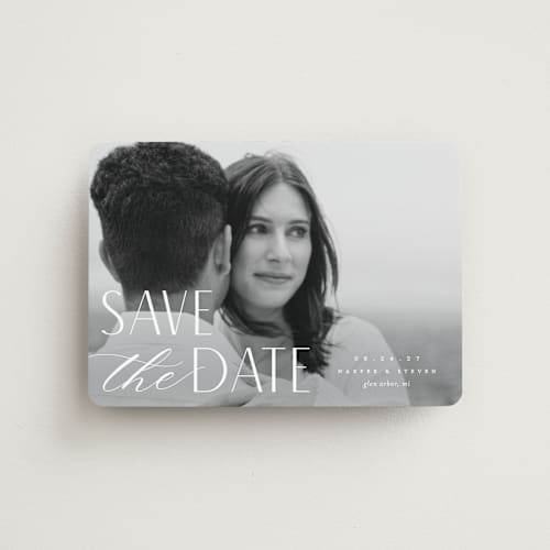 This is a snow save the date magnets with standard by Pixel and Hank called yours forever printing on magnet paper in magnet