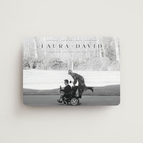 This is a midnight save the date magnets with standard by Abi de Leon called lovingly printing on magnet paper in magnet