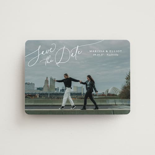 This is a pearl save the date magnets with standard by Kaydi Bishop called on the horizon printing on magnet paper in magnet
