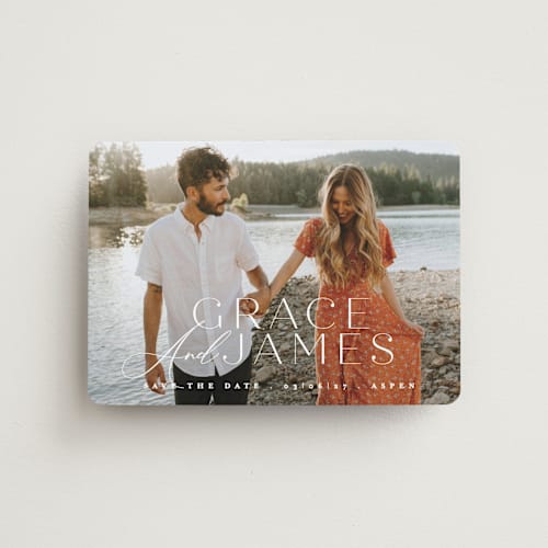 This is a snow save the date magnets with standard by Angela Thompson called namesake printing on magnet paper in magnet