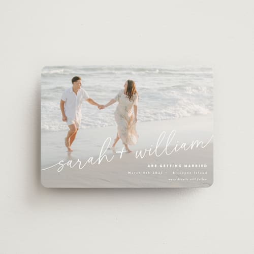 This is a ivory save the date magnets with standard by Jessie Steury called sweet script printing on magnet paper in magnet