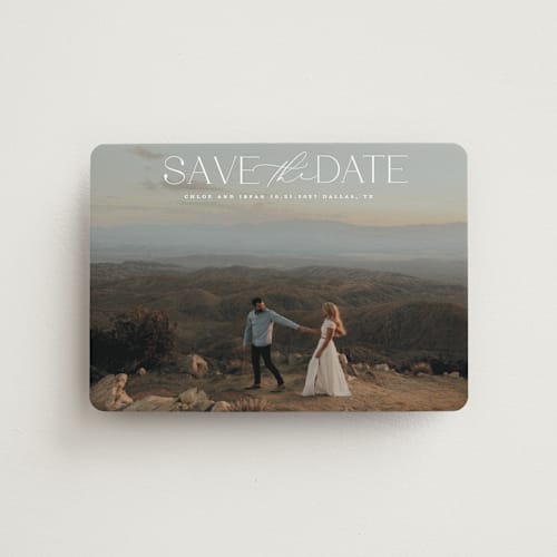 This is a ivory save the date magnets with standard by Maja Cunningham called prose printing on magnet paper in magnet