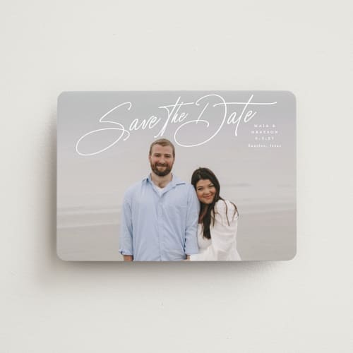 This is a snow save the date magnets with standard by Lauren Chism called sweetest love printing on magnet paper in magnet