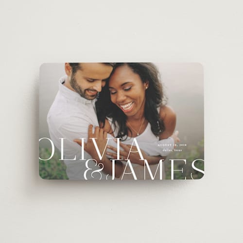 This is a pearl save the date magnets with standard by Lauren Chism called this couple printing on magnet paper in magnet