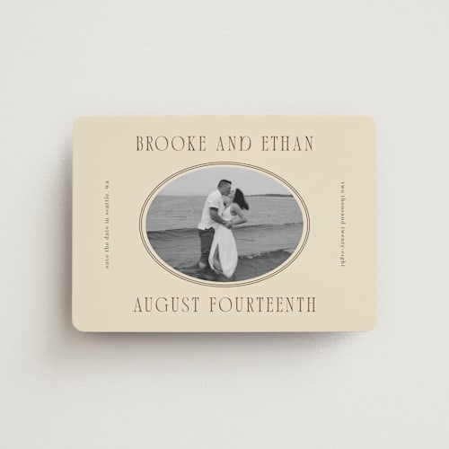 This is a buttercream save the date magnets with standard by Angela Garrick called ethan printing on magnet paper in magnet