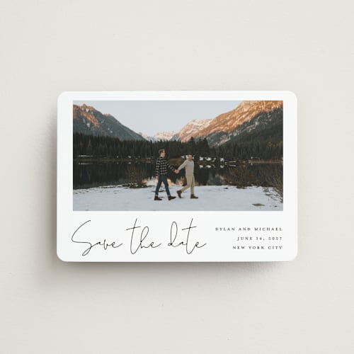 This is a cloud save the date magnets with standard by Katherine Moynagh called scripted style printing on magnet paper in magnet
