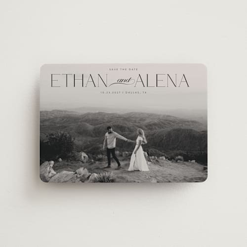 This is a ebony save the date magnets with standard by Maja Cunningham called all our love printing on magnet paper in magnet