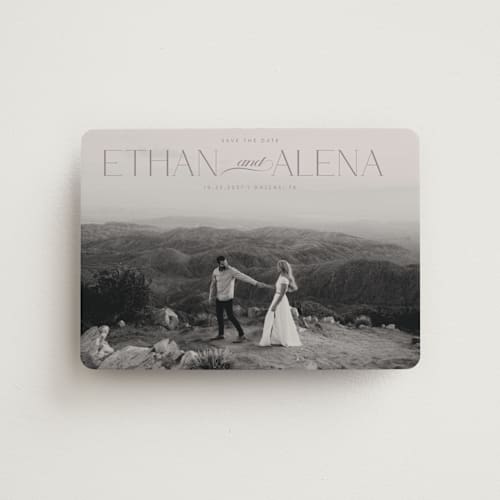 This is a suede save the date magnets with standard by Maja Cunningham called all our love printing on magnet paper in magnet