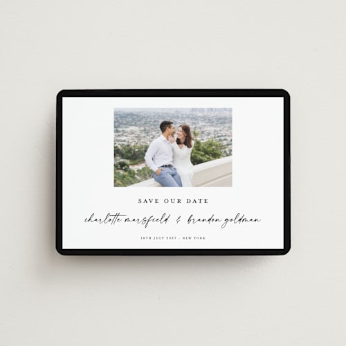 This is a onyx save the date magnets with standard by Devika Keskar called main event printing on magnet paper in magnet