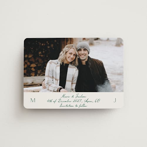 This is a ivory save the date magnets with standard by Petra Kern called simple scripty printing on magnet paper in magnet