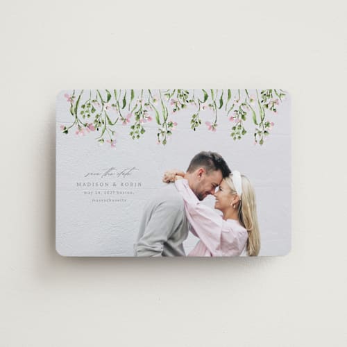 This is a petunia save the date magnets with standard by Claudia Orengo called growing together printing on magnet paper in magnet