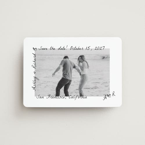 This is a graphite save the date magnets with standard by Claudia Orengo called showered printing on magnet paper in magnet