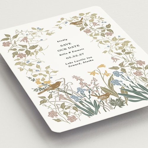 This is a mauve save the date magnets with standard by Cedar and Grey called wild clematis printing on magnet paper in magnet