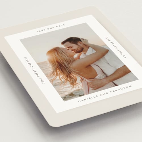 This is a ivory save the date magnets with standard by Tamara Hilje called horizonte printing on magnet paper in magnet