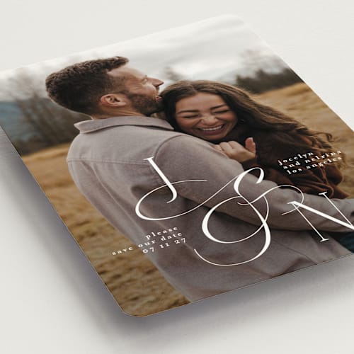 This is a ivory save the date magnets with standard by Phrosné Barwood called beautiful monogram printing on magnet paper in magnet