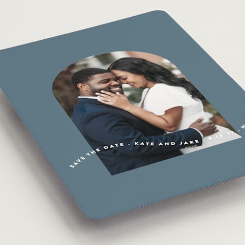 This is a dusty blue save the date magnets with standard by Leah Ragain called wavy arch printing on magnet paper in magnet