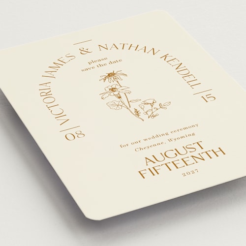 This is a cream save the date magnets with standard by Baumbirdy called floral type arch printing on magnet paper in magnet