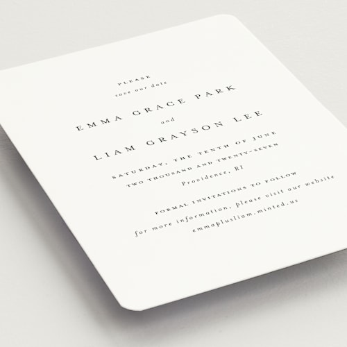 This is a classic white save the date magnets with standard by Design Lotus called a thousand years printing on magnet paper in magnet