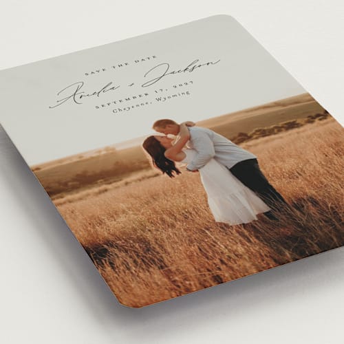 This is a onyx save the date magnets with standard by Emily Betts called simple names printing on magnet paper in magnet
