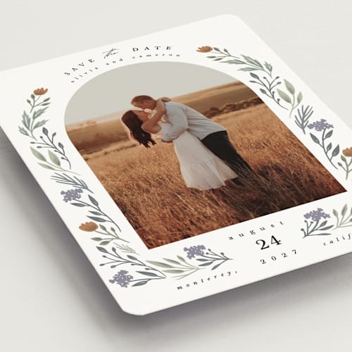 This is a rust save the date magnets with standard by Hannah Williams called floral arch printing on magnet paper in magnet