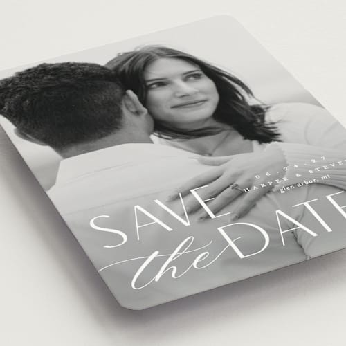 This is a snow save the date magnets with standard by Pixel and Hank called yours forever printing on magnet paper in magnet