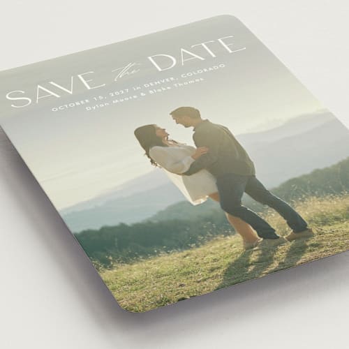 This is a cloud save the date magnets with standard by Kate Ahn called monterosso printing on magnet paper in magnet