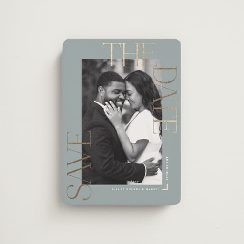 This is a pebble save the date magnets with foil pressed by Susan Zinader called picturesque printing on magnet paper in magnet