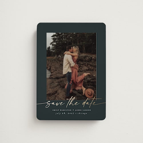 This is a midnight save the date magnets with foil pressed by Nicole Walsh called wrapped printing on magnet paper in magnet