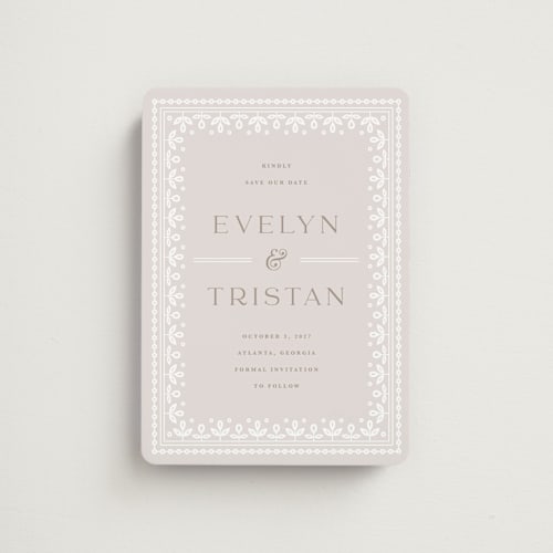 This is a cream save the date magnets with standard by Kristen Smith called lace trim printing on magnet paper in magnet